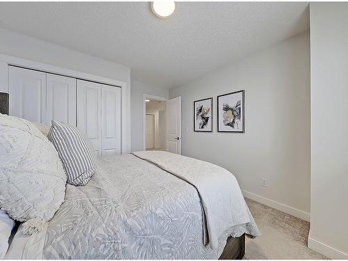 149 Rockyspring Grove Nw, Calgary, AB - Indoor Photo Showing Bedroom