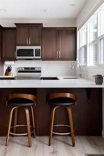 333 Clydesdale Way, Cochrane, AB - Indoor Photo Showing Kitchen