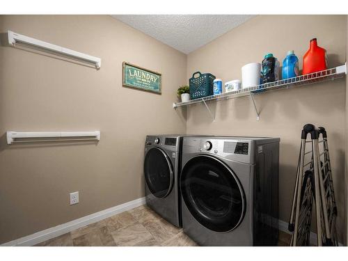 333 Clydesdale Way, Cochrane, AB - Indoor Photo Showing Laundry Room