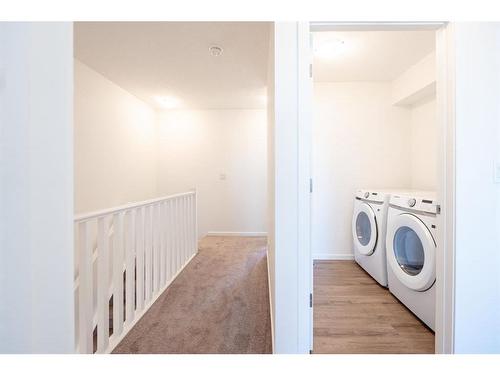 571 Osborne Dr Sw, Airdrie, AB - Indoor Photo Showing Laundry Room