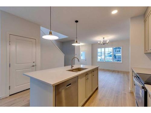 802 Bayview Terrace Sw, Airdrie, AB - Indoor Photo Showing Kitchen With Double Sink