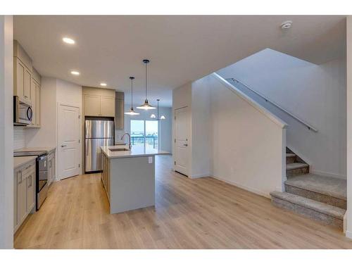 802 Bayview Terrace Sw, Airdrie, AB - Indoor Photo Showing Kitchen With Stainless Steel Kitchen With Upgraded Kitchen