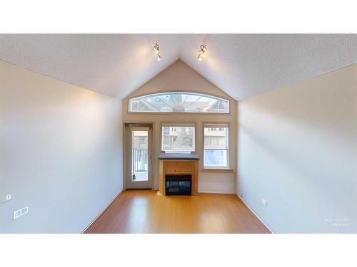 305-176 Kananaskis Way, Canmore, AB - Indoor With Fireplace