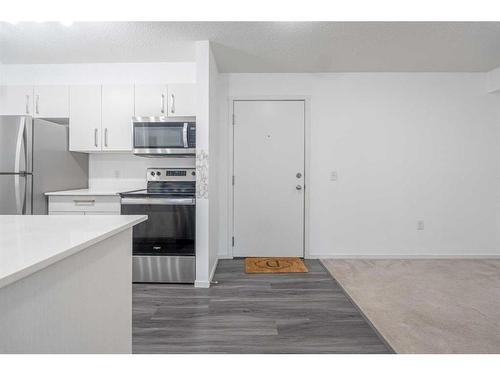 3321-4641 128 Avenue Ne, Calgary, AB - Indoor Photo Showing Kitchen With Stainless Steel Kitchen