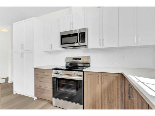 767 South Point Heath Sw, Airdrie, AB - Indoor Photo Showing Kitchen