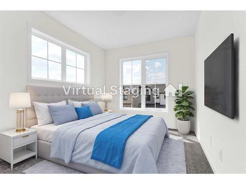 767 South Point Heath Sw, Airdrie, AB - Indoor Photo Showing Bedroom