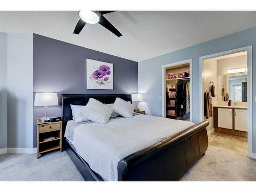 19 Woodside Crescent Nw, Airdrie, AB - Indoor Photo Showing Bedroom