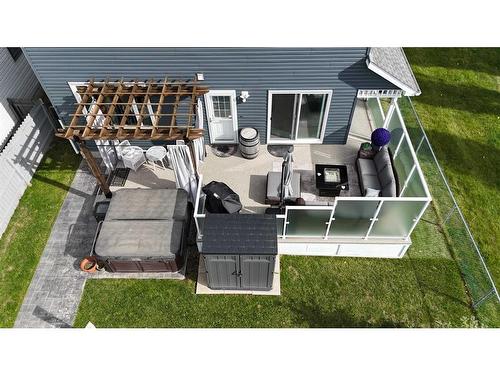 19 Woodside Crescent Nw, Airdrie, AB - Outdoor With Deck Patio Veranda