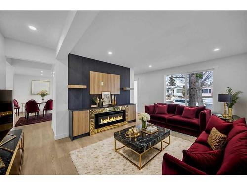 5915 Rundlehorn Drive Ne, Calgary, AB - Indoor Photo Showing Living Room With Fireplace