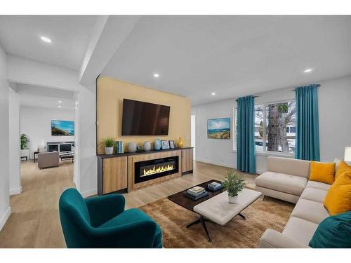 5915 Rundlehorn Drive Ne, Calgary, AB - Indoor Photo Showing Living Room With Fireplace