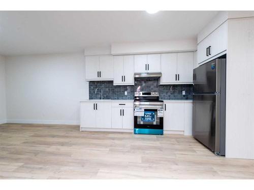 148 Saddlelake Manor Ne, Calgary, AB - Indoor Photo Showing Kitchen