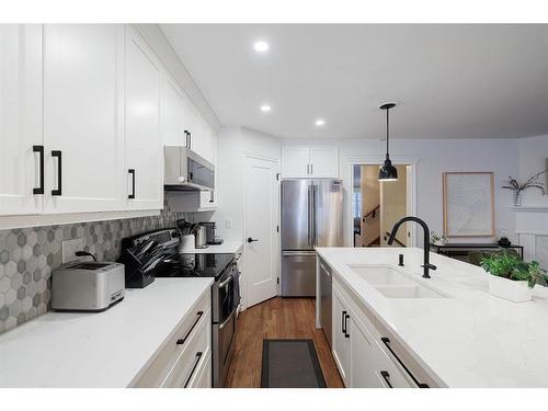 2726 7 Avenue Nw, Calgary, AB - Indoor Photo Showing Kitchen With Stainless Steel Kitchen With Double Sink With Upgraded Kitchen