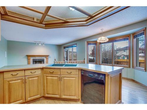 149 Shannon Crescent Sw, Calgary, AB - Indoor Photo Showing Kitchen With Double Sink