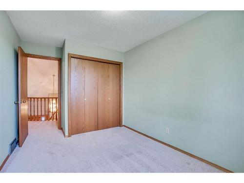 149 Shannon Crescent Sw, Calgary, AB - Indoor Photo Showing Other Room