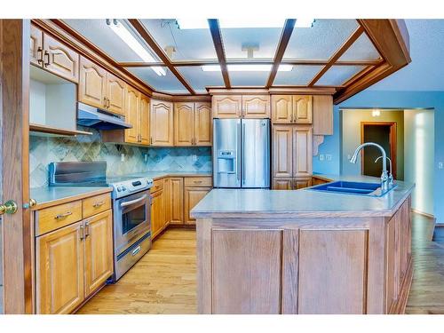 149 Shannon Crescent Sw, Calgary, AB - Indoor Photo Showing Kitchen With Double Sink