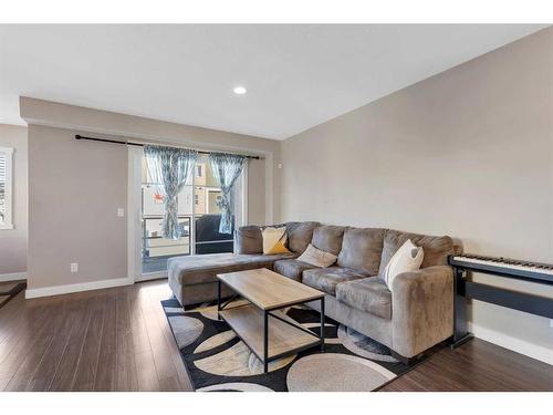 704 Redstone View Ne, Calgary, AB - Indoor Photo Showing Living Room