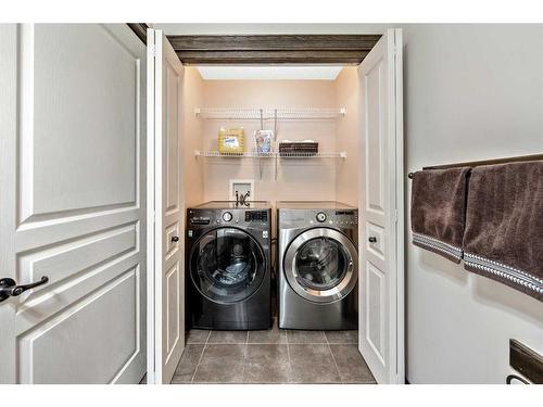 21 Silverado Range Bay Sw, Calgary, AB - Indoor Photo Showing Laundry Room