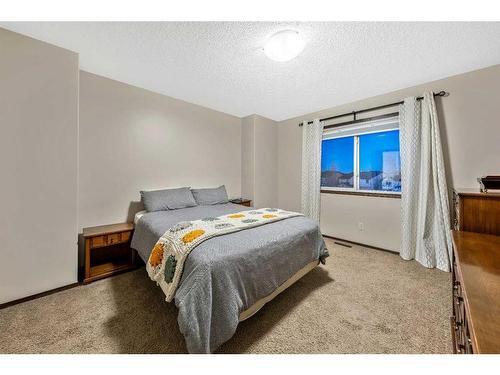 21 Silverado Range Bay Sw, Calgary, AB - Indoor Photo Showing Bedroom