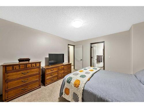 21 Silverado Range Bay Sw, Calgary, AB - Indoor Photo Showing Bedroom