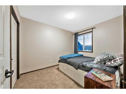 21 Silverado Range Bay Sw, Calgary, AB - Indoor Photo Showing Bedroom