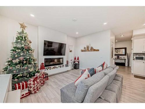 140 Nolanhurst Heights Nw, Calgary, AB - Indoor Photo Showing Living Room With Fireplace