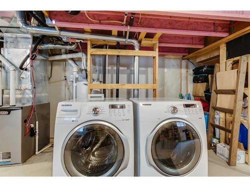 145 Drake Landing Loop, Okotoks, AB - Indoor Photo Showing Laundry Room