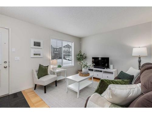 145 Drake Landing Loop, Okotoks, AB - Indoor Photo Showing Living Room