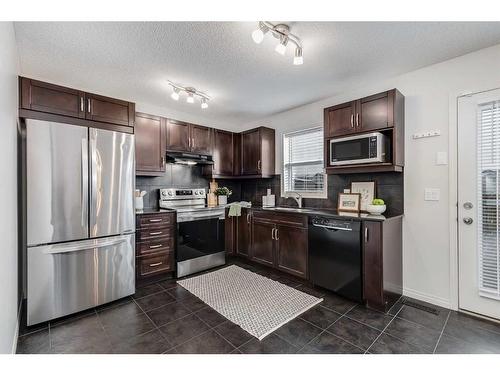 145 Drake Landing Loop, Okotoks, AB - Indoor Photo Showing Kitchen