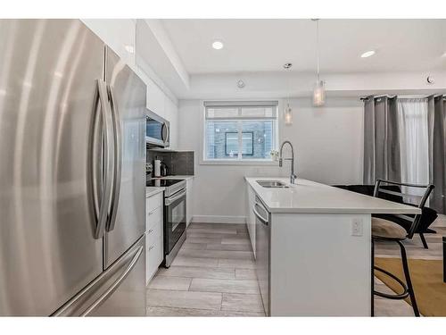 4659 Seton Drive Se, Calgary, AB - Indoor Photo Showing Kitchen With Upgraded Kitchen