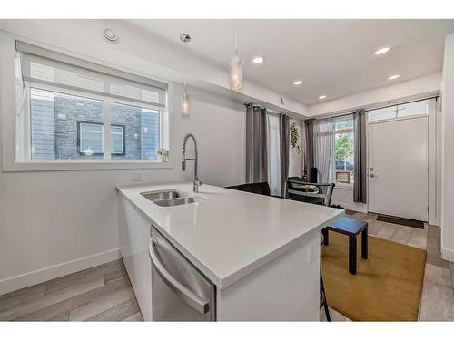 4659 Seton Drive Se, Calgary, AB - Indoor Photo Showing Kitchen With Double Sink