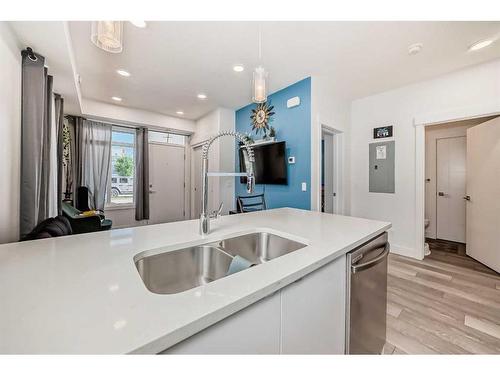 4659 Seton Drive Se, Calgary, AB - Indoor Photo Showing Kitchen With Double Sink