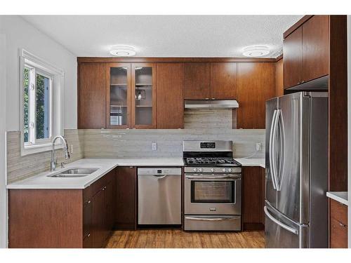 82 Taraglen Road Ne, Calgary, AB - Indoor Photo Showing Kitchen With Stainless Steel Kitchen With Double Sink