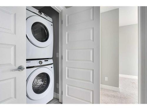 3103-410 Seton Passage Se, Calgary, AB - Indoor Photo Showing Laundry Room