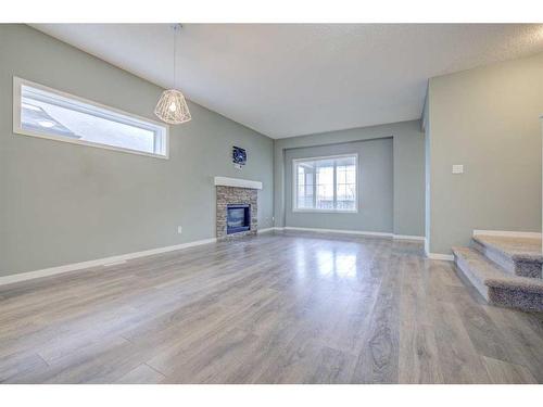 2260 Mahogany Boulevard Se, Calgary, AB - Indoor Photo Showing Other Room With Fireplace