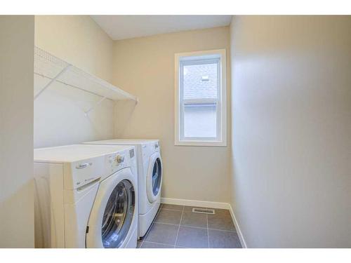 2260 Mahogany Boulevard Se, Calgary, AB - Indoor Photo Showing Laundry Room