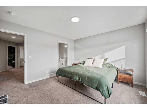 180 Rowmont Boulevard Nw, Calgary, AB - Indoor Photo Showing Bedroom