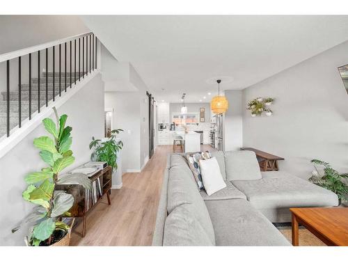 180 Rowmont Boulevard Nw, Calgary, AB - Indoor Photo Showing Living Room