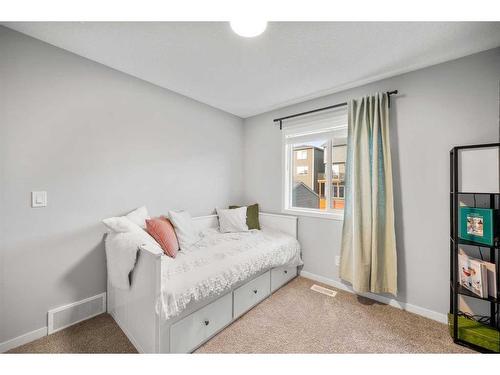 180 Rowmont Boulevard Nw, Calgary, AB - Indoor Photo Showing Bedroom