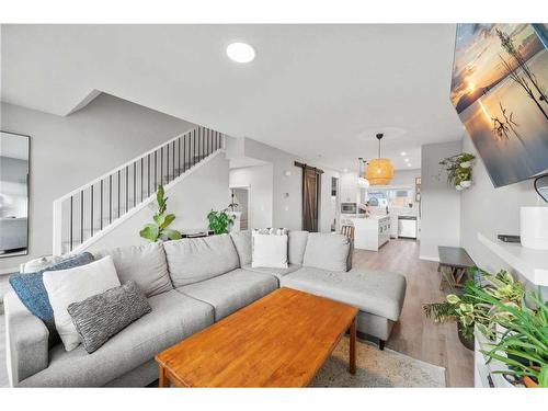 180 Rowmont Boulevard Nw, Calgary, AB - Indoor Photo Showing Living Room