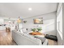 180 Rowmont Boulevard Nw, Calgary, AB  - Indoor Photo Showing Living Room 