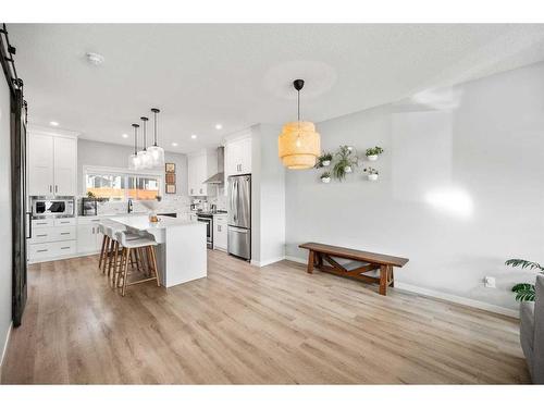 180 Rowmont Boulevard Nw, Calgary, AB - Indoor Photo Showing Kitchen With Upgraded Kitchen