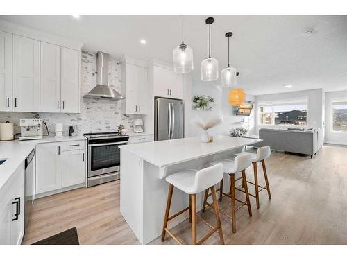 180 Rowmont Boulevard Nw, Calgary, AB - Indoor Photo Showing Kitchen With Stainless Steel Kitchen With Upgraded Kitchen