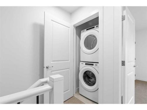 110-8235 8 Avenue, Calgary, AB - Indoor Photo Showing Laundry Room