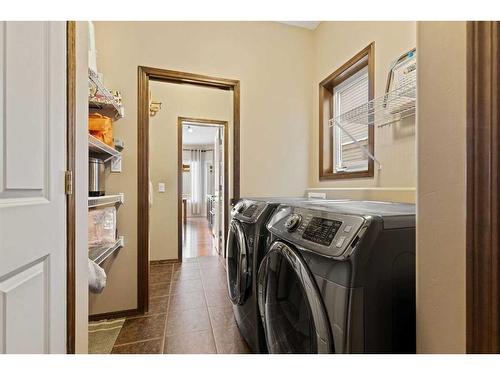 46 West Pointe Manor, Cochrane, AB - Indoor Photo Showing Laundry Room