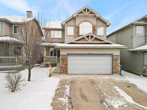 46 West Pointe Manor, Cochrane, AB - Outdoor With Facade