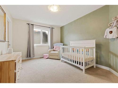 46 West Pointe Manor, Cochrane, AB - Indoor Photo Showing Bedroom