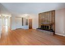 3107 Leduc Crescent Sw, Calgary, AB  - Indoor Photo Showing Living Room With Fireplace 