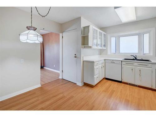 3107 Leduc Crescent Sw, Calgary, AB - Indoor Photo Showing Kitchen With Double Sink