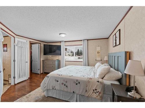 10 Downie Close, Carstairs, AB - Indoor Photo Showing Bedroom