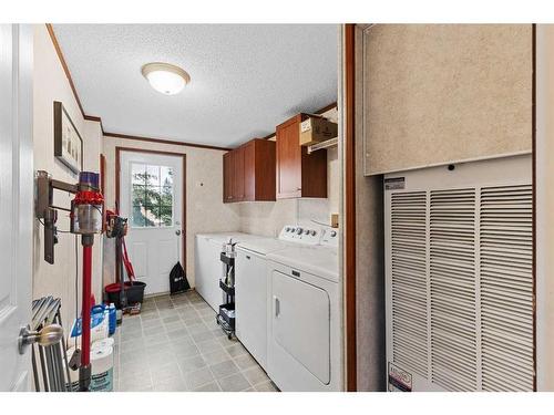 10 Downie Close, Carstairs, AB - Indoor Photo Showing Laundry Room